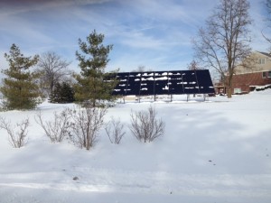 Snow Covered Solar Array At 40 Degree Angle